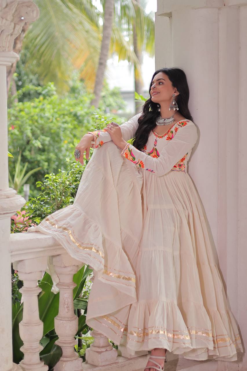 Off White Kora Cotton Embroidered Gown with Multi-Thread & Gota Patti Work – Full Sleeves, 12 Meter Flair, Fully Stitched ClothsVilla