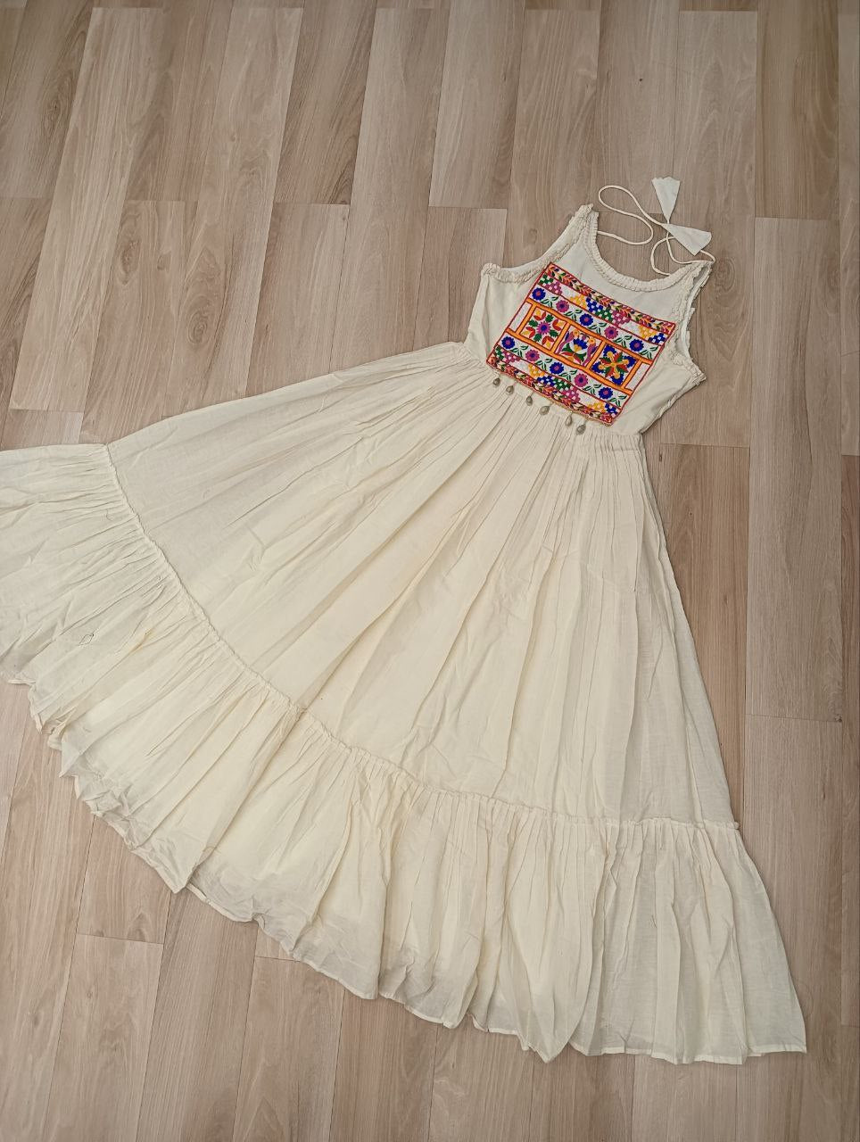 Off-White Kora Cotton Sleeveless Embroidered Gown with 8-Meter Flair ClothsVilla