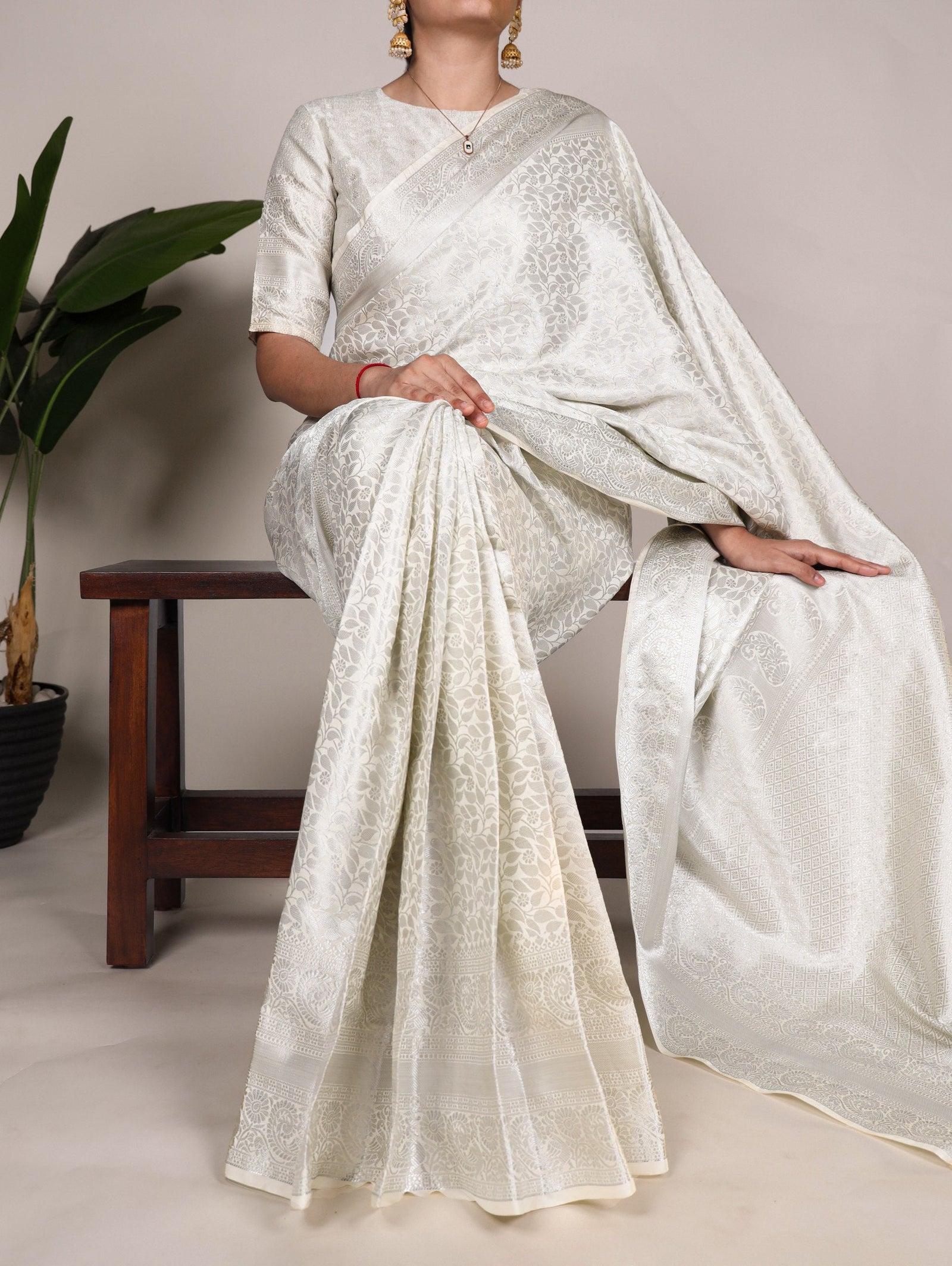 Off White Timeless Kanjivaram Saree with Exquisite Zari Weaving ClothsVilla