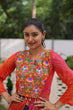 Load image into Gallery viewer, Orange Bandhani Print Faux Georgette Kurti with Kutchi Patchwork ClothsVilla