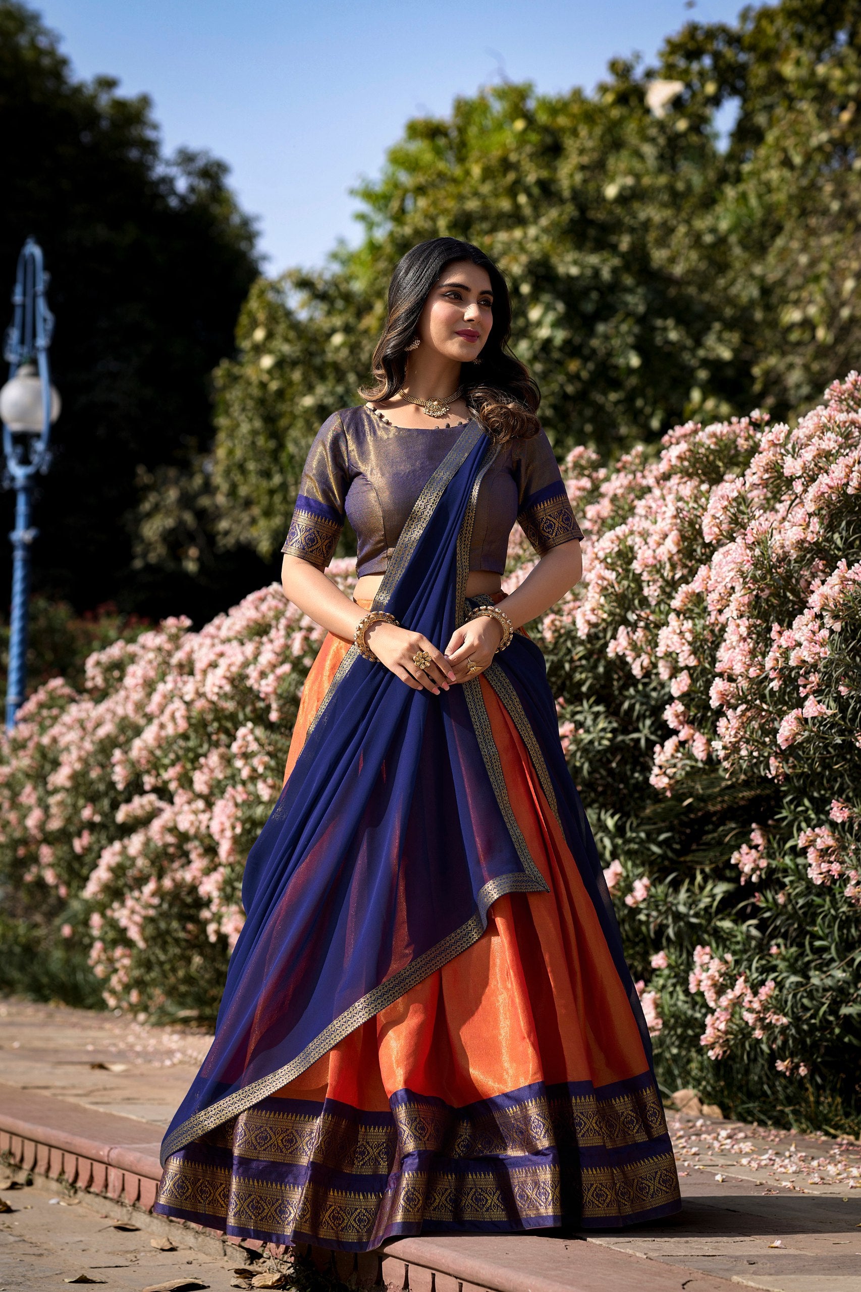 Orange Breathtaking South-Indian Kanchipuram Silk Lehenga Choli Set with Zari Weaving ClothsVilla Main image