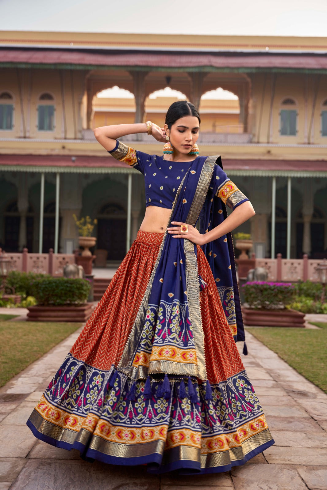 Orange Captivating Tussar Silk Patola Printed Lehenga Choli Set ClothsVilla