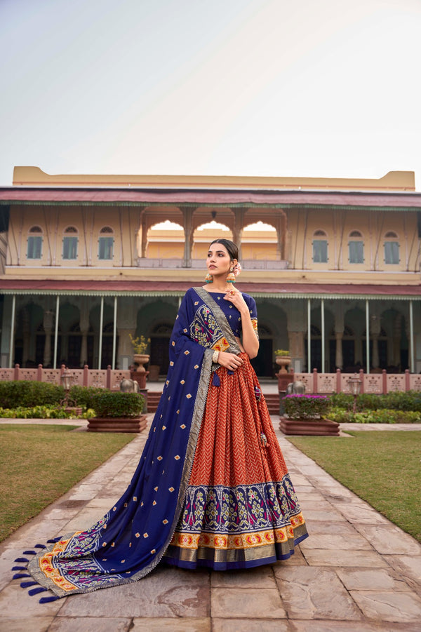 Orange Captivating Tussar Silk Patola Printed Lehenga Choli Set ClothsVilla