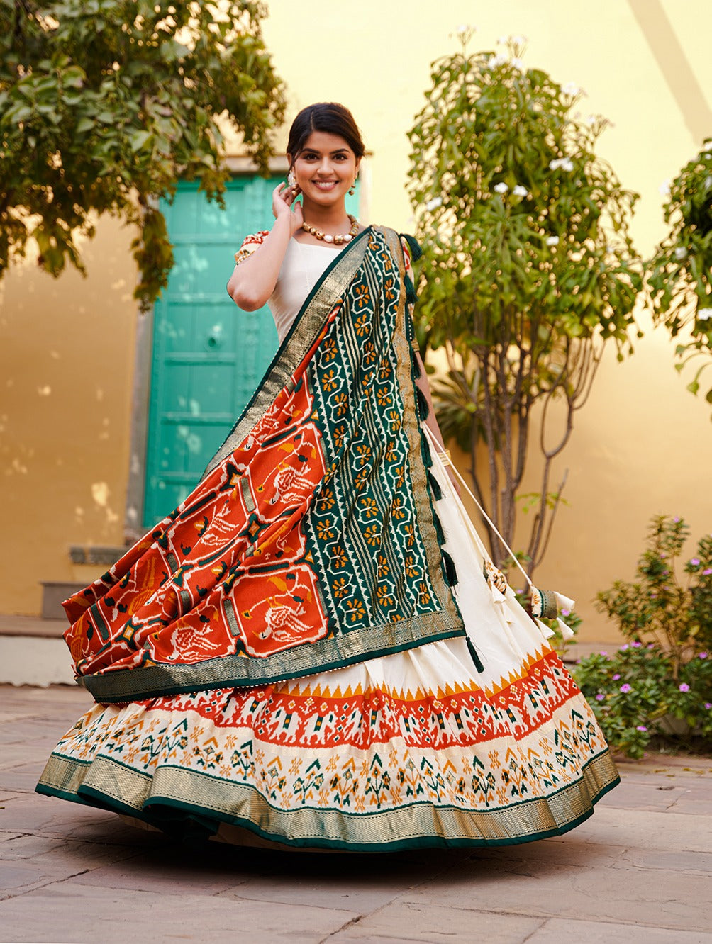 Orange Color Patola Print Tussar Silk Lehenga Choli with Foil Detailing ClothsVilla