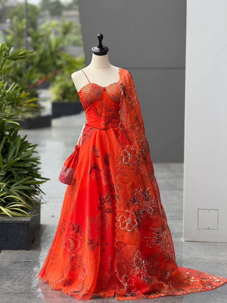 Orange Designer Organza Lehenga Set with Corset Blouse, Dupatta & Batwa ClothsVilla