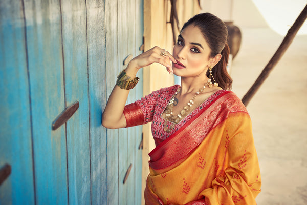 Orange Elegant Banarasi Silk Blend Saree with Zari Woven Design ClothsVilla