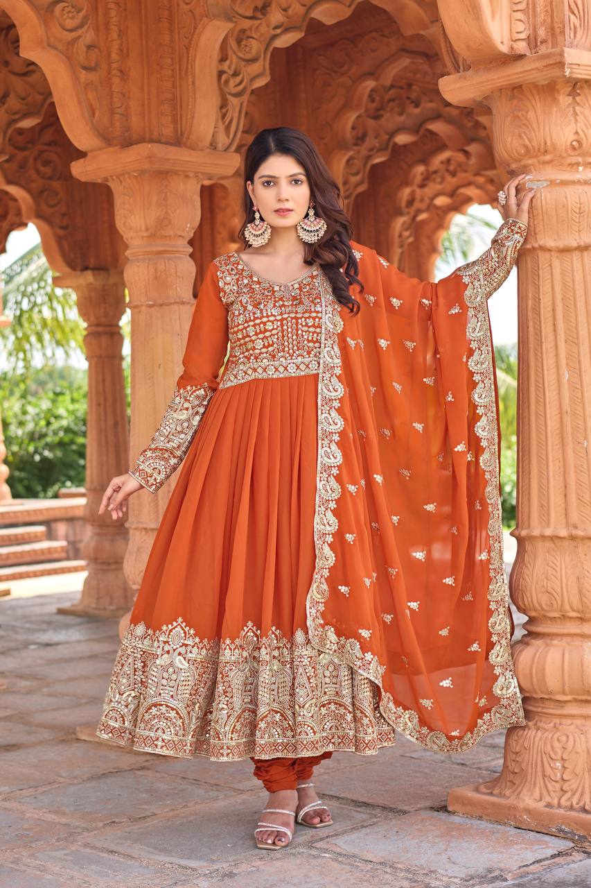 Orange Elegant Embroidered Faux Georgette Gown Set with Dupatta & Chudidar – Fully Stitched Ensemble with 5mm Sequins Work & Tassel Sleeves ClothsVilla