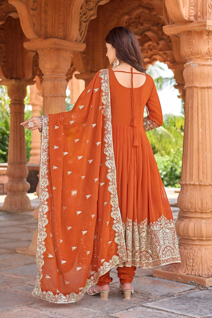 Orange Elegant Embroidered Faux Georgette Gown Set with Dupatta & Chudidar – Fully Stitched Ensemble with 5mm Sequins Work & Tassel Sleeves ClothsVilla
