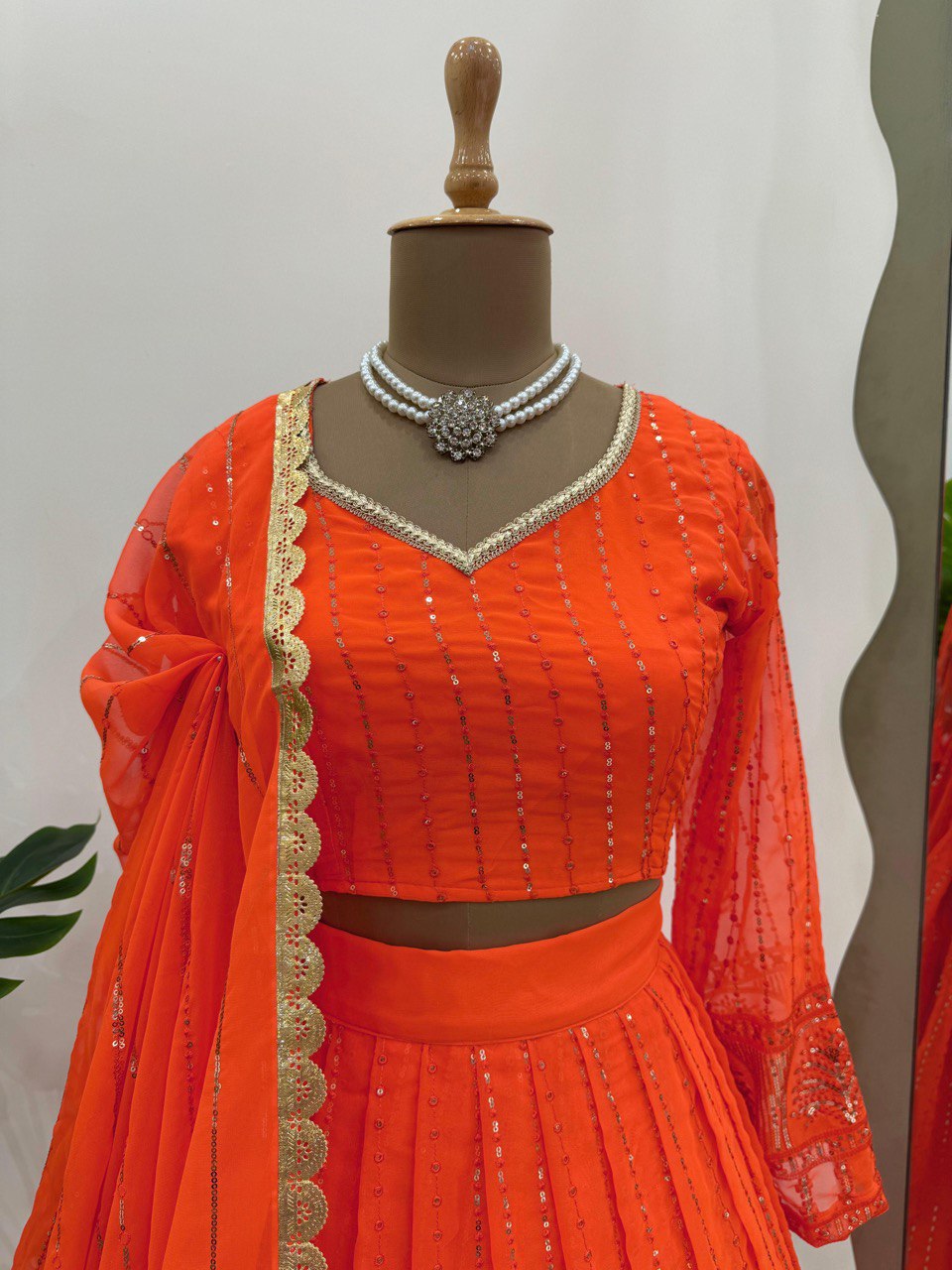 Orange Elegant Faux Georgette Lehenga Choli Set with Thread & Sequin Work ClothsVilla