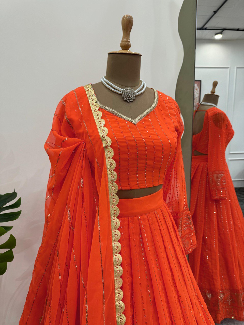 Orange Elegant Faux Georgette Lehenga Choli Set with Thread & Sequin Work ClothsVilla