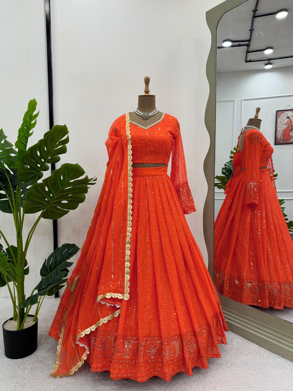Orange Elegant Faux Georgette Lehenga Choli Set with Thread & Sequin Work ClothsVilla