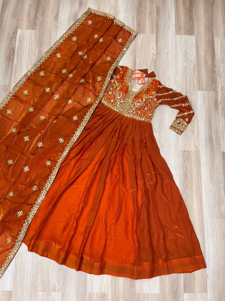 Orange Elegant Fendy Fabric Embroidered Gown with Dupatta Se Orange Elegant Fendy Fabric Embroidered Gown with Dupatta Se