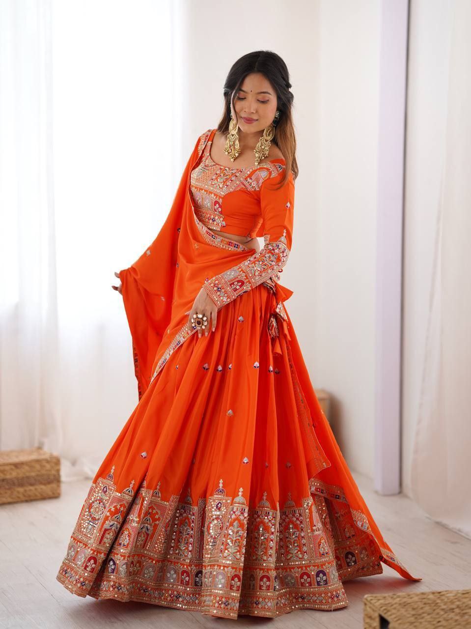 Orange Elegant French Crepe Multi-Thread & Sequin Embroidered Semi-Stitched Lehenga Choli with Matching Orange Dupatta ClothsVilla