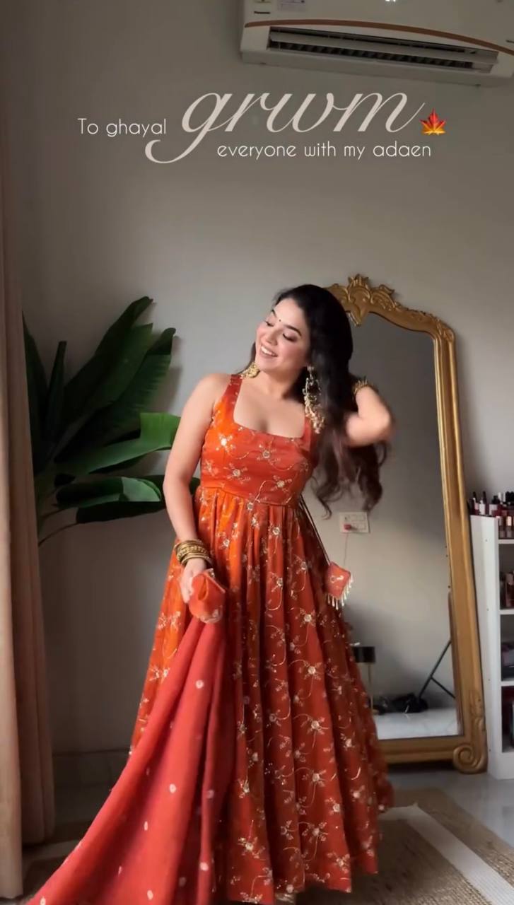 Orange Elegant KesriyaNC Silk Kali Cut Gown Set with Heavy Sequins Embroidery, Micro Fabric Pant & Matching Dupatta – Stitched Ensemble Clothsvilla
