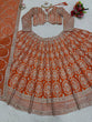 Load image into Gallery viewer, Orange Faux Georgette Semi-Stitched Lehenga Set with Coding Dori &amp; Sequin Work ClothsVilla
