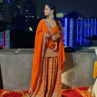 Orange Graceful Faux Georgette Embroidered Plazo Set with Dupatta ClothsVilla