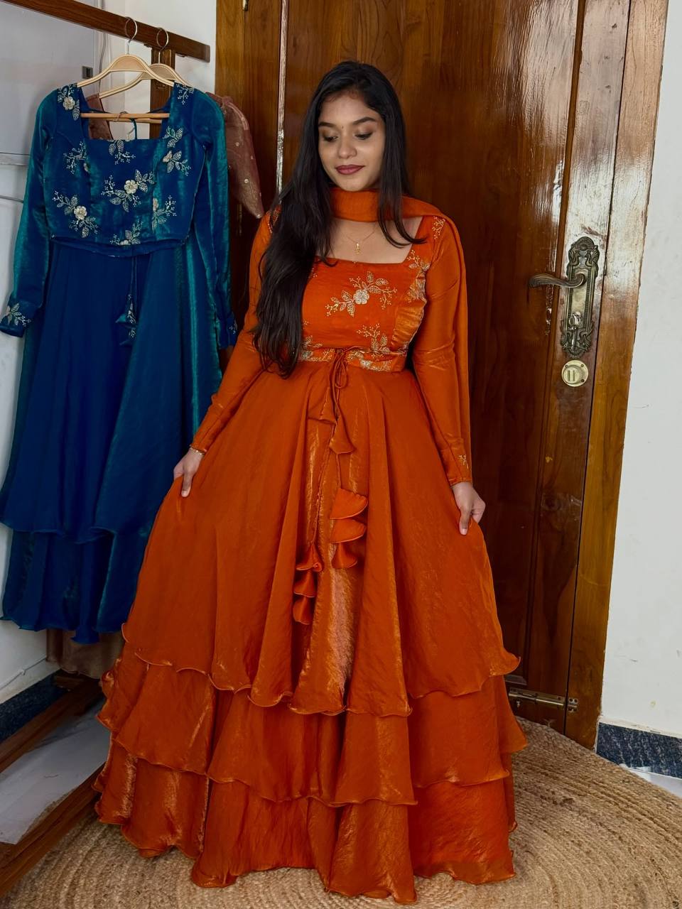 Orange Heavy Fandy Satin Embroidered Lehenga Choli Set ClothsVilla Main image