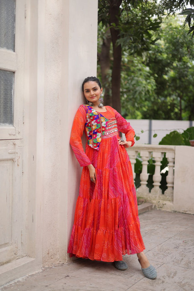 Orange Navratri Special Laheriya & Bandhej Printed Faux Georgette Gown with Kutchi Patchwork ClothsVilla