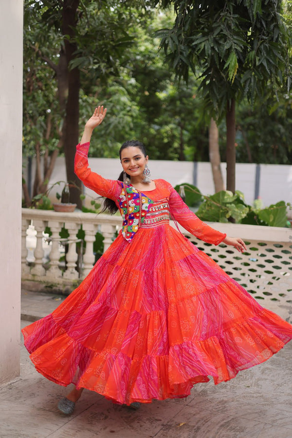 Orange Navratri Special Laheriya & Bandhej Printed Faux Georgette Gown with Kutchi Patchwork ClothsVilla