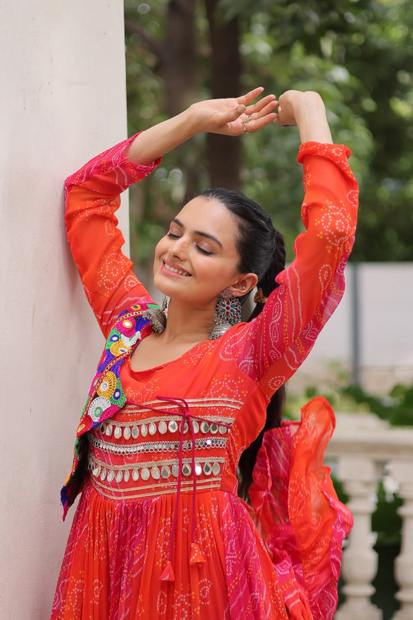Orange Navratri Special Laheriya & Bandhej Printed Faux Georgette Gown with Kutchi Patchwork ClothsVilla