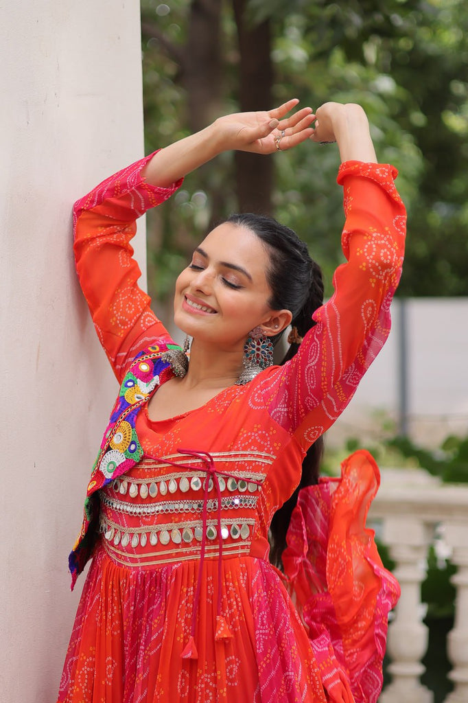 Orange Navratri Special Laheriya & Bandhej Printed Faux Georgette Gown with Kutchi Patchwork ClothsVilla