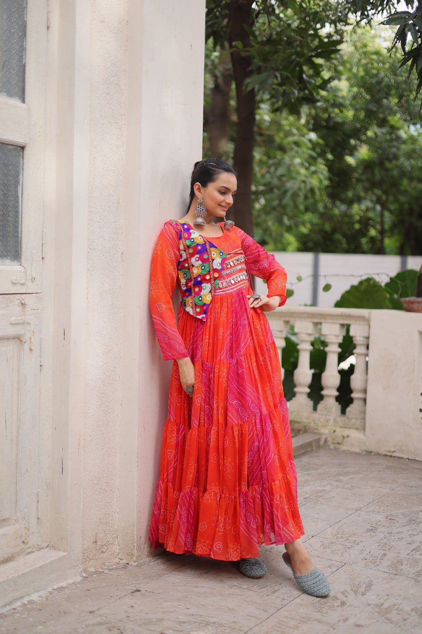 Orange Navratri Special Laheriya & Bandhej Printed Faux Georgette Gown with Kutchi Patchwork ClothsVilla