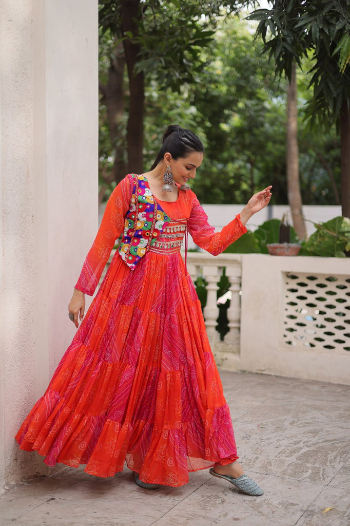 Orange Navratri Special Laheriya & Bandhej Printed Faux Georgette Gown with Kutchi Patchwork ClothsVilla