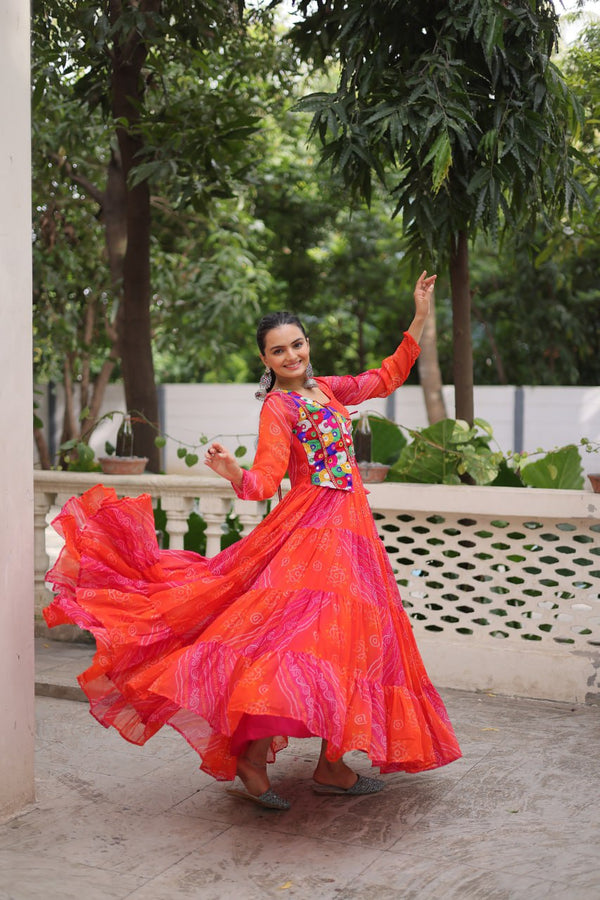 Orange Navratri Special Laheriya & Bandhej Printed Faux Georgette Gown with Kutchi Patchwork ClothsVilla