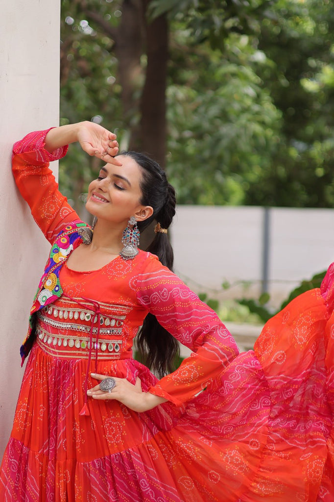 Orange Navratri Special Laheriya & Bandhej Printed Faux Georgette Gown with Kutchi Patchwork ClothsVilla
