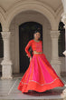 Load image into Gallery viewer, Orange &amp; Pink Roman Fabric Lehenga Choli with Mirror Lace &amp; Gamthi Thread Work ClothsVilla