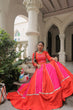 Load image into Gallery viewer, Orange &amp; Pink Roman Fabric Lehenga Choli with Mirror Lace &amp; Gamthi Thread Work ClothsVilla
