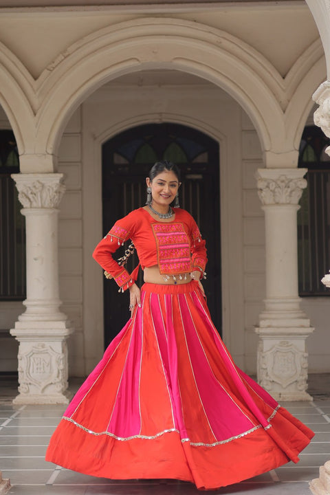 Orange & Pink Roman Fabric Lehenga Choli with Mirror Lace & Gamthi Thread Work ClothsVilla Main image