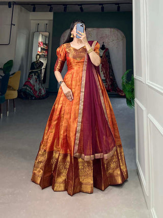 Regal Orange Zari Woven Kanjivaram Gown with Net Dupatta ClothsVilla