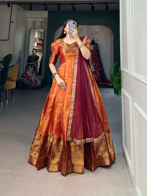 Regal Orange Zari Woven Kanjivaram Gown with Net Dupatta ClothsVilla