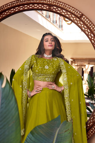 Parrot Designer Embellished Lehenga Set in Vichitra Silk, Weone Silk, Star Georgette & New Crush Clothsvilla