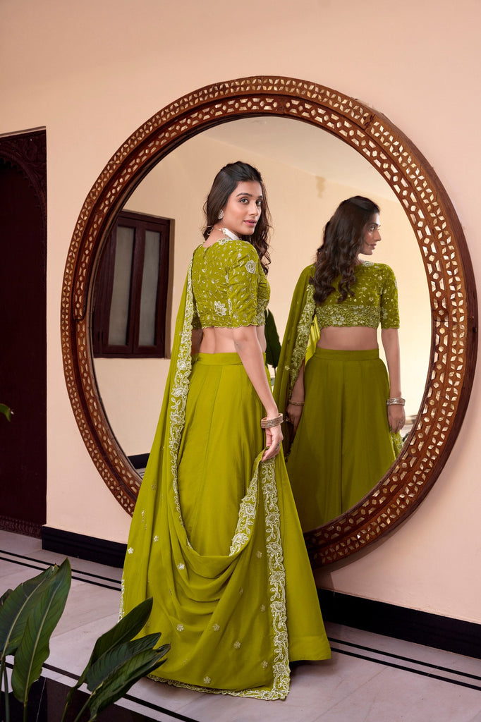 Parrot Designer Embellished Lehenga Set in Vichitra Silk, Weone Silk, Star Georgette & New Crush Clothsvilla