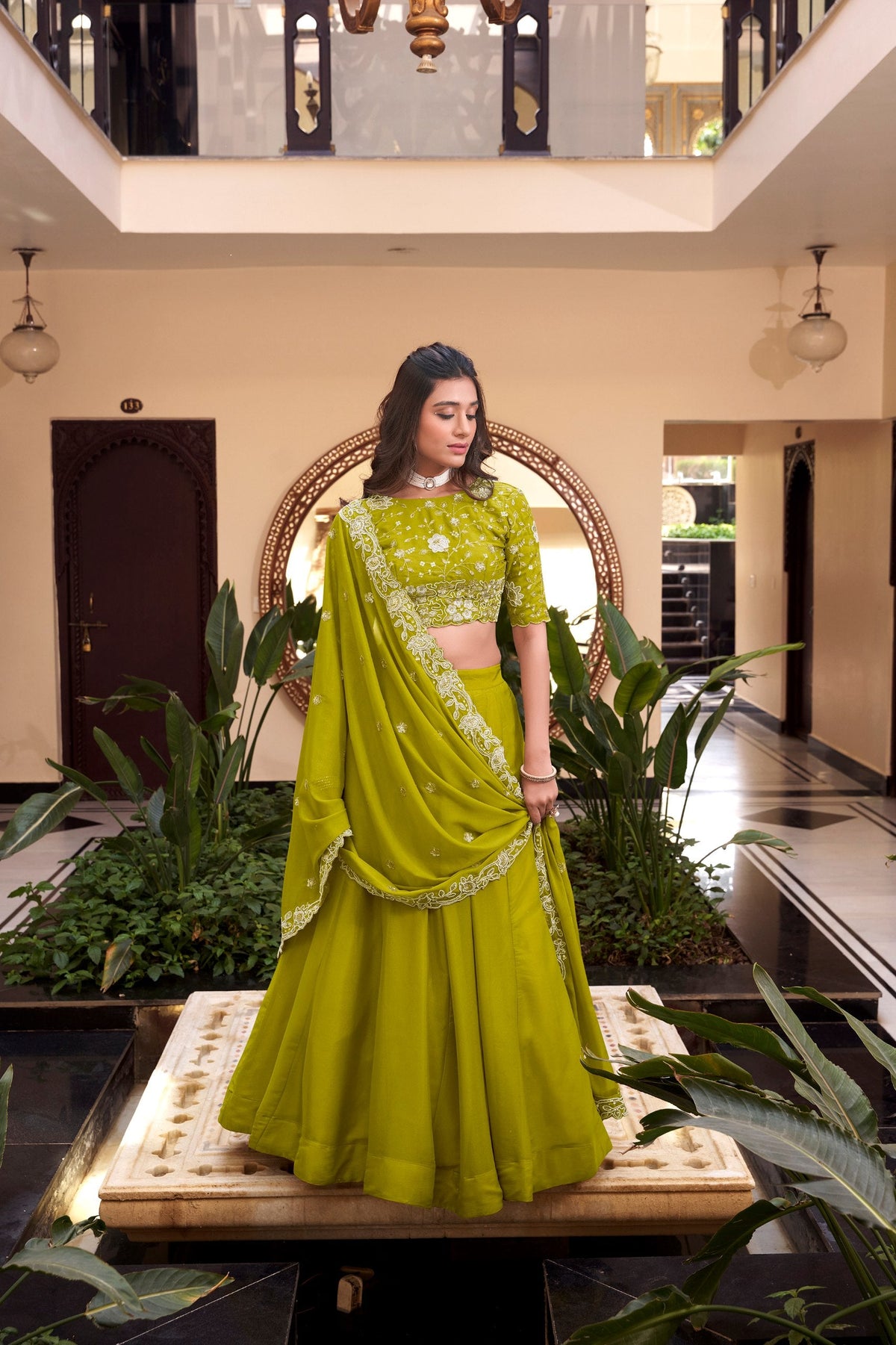 Parrot Designer Embellished Lehenga Set in Vichitra Silk, Weone Silk, Star Georgette & New Crush Clothsvilla Main image