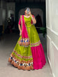 Load image into Gallery viewer, Parrot Green Navratri Lehenga Set with Gamthi Work and Cowrie Lace ClothsVilla