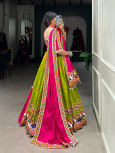 Load image into Gallery viewer, Parrot Green Navratri Lehenga Set with Gamthi Work and Cowrie Lace ClothsVilla