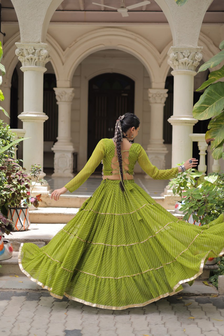 Parrot Green Navratri Special Leheriya Print Lehenga Choli with 12 Mtr Flair & Mirror Lace Work ClothsVilla
