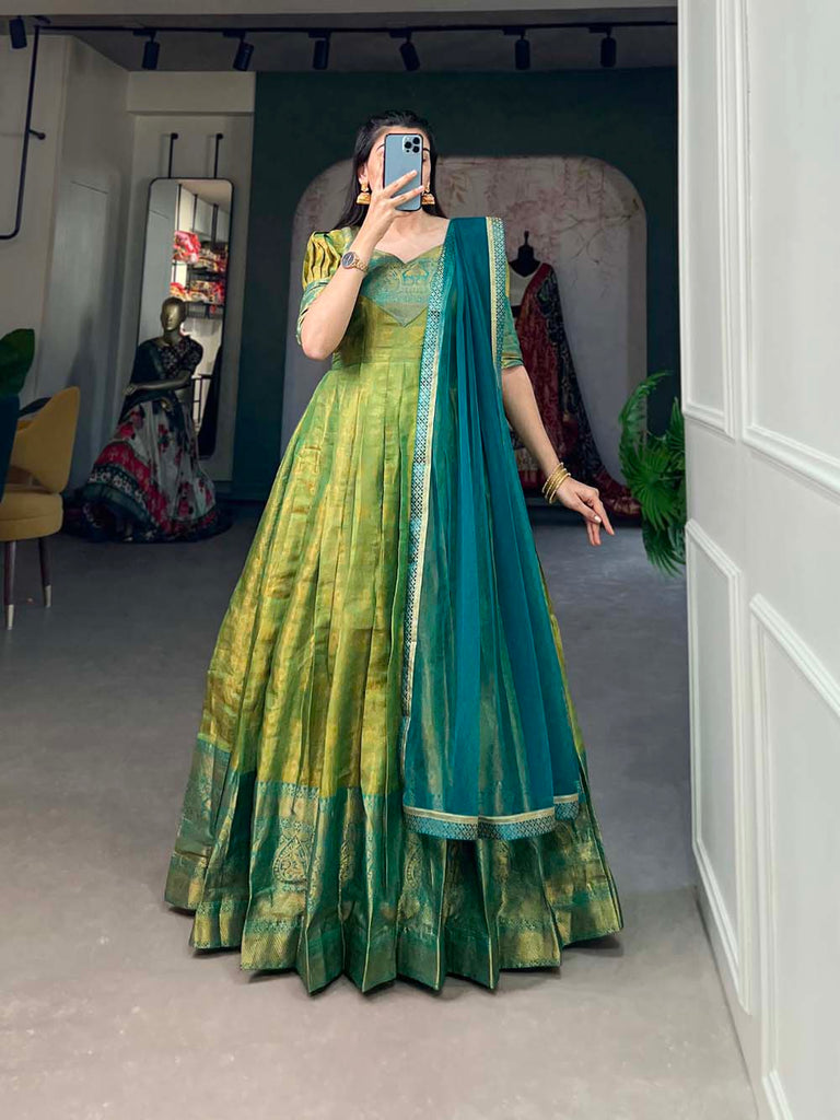 Regal Parrot Green Zari Woven Kanjivaram Gown with Net Dupat Regal Parrot Green Zari Woven Kanjivaram Gown with Net Dupat