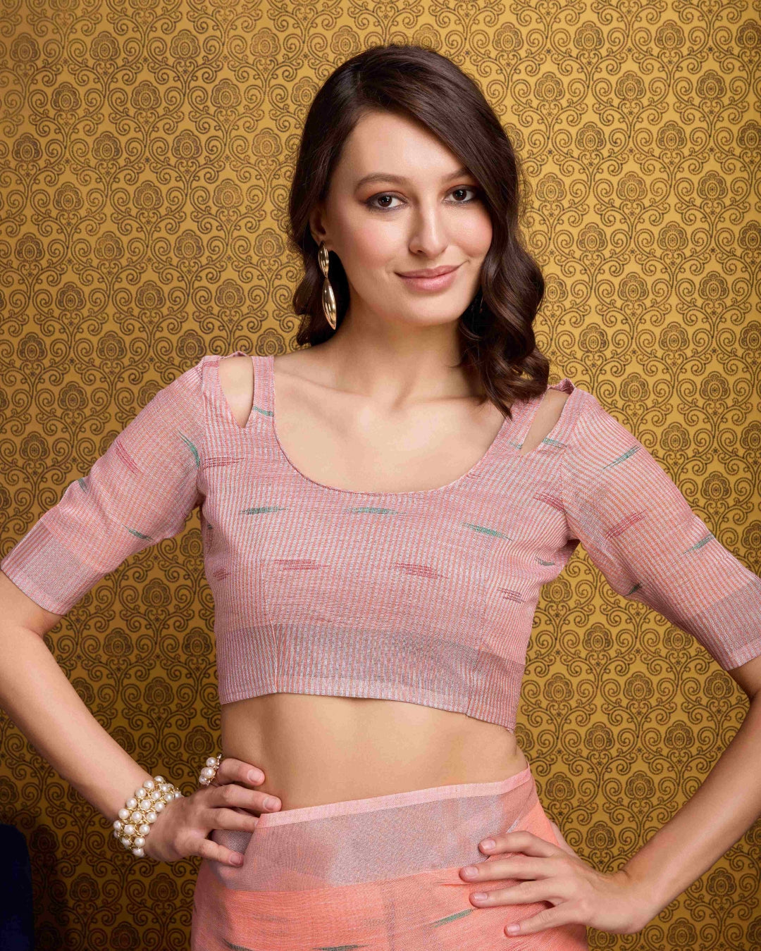 Peach Elegant & Gold-Toned Ikat Woven Saree with Zari Border ClothsVilla