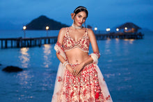 Load image into Gallery viewer, Peach Net Sequins, Mirror and thread embroidery Semi-Stitched Lehenga choli &amp; Dupatta ClothsVilla