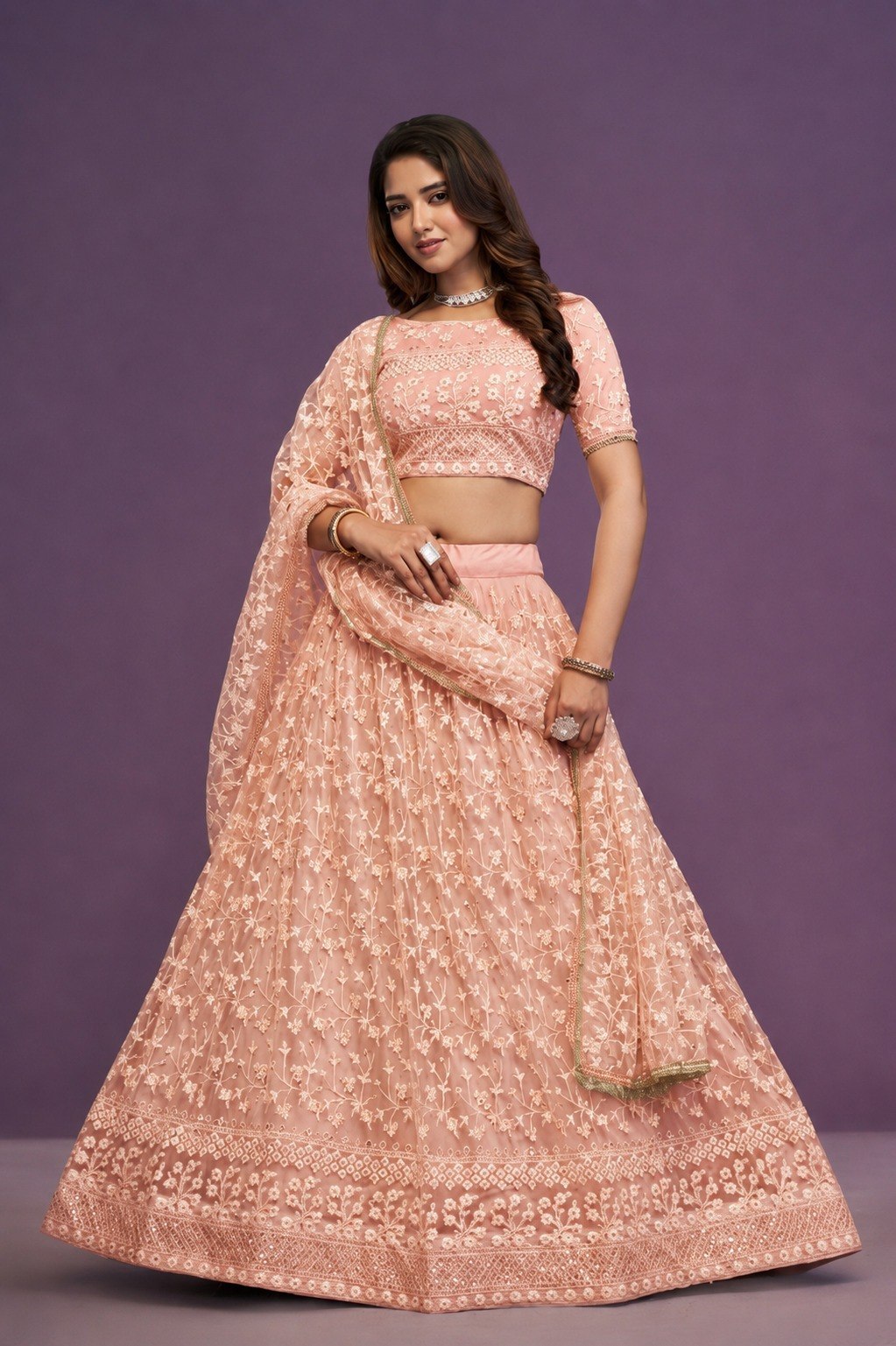 Peach Sequence Embroidered Net Lehenga Clothsvilla