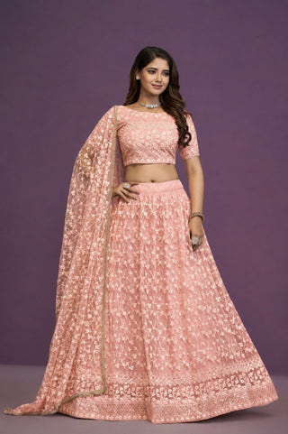 Peach Sequence Embroidered Net Lehenga Clothsvilla