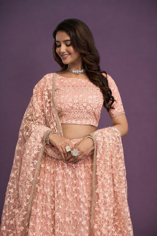 Peach Sequence Embroidered Net Lehenga Clothsvilla