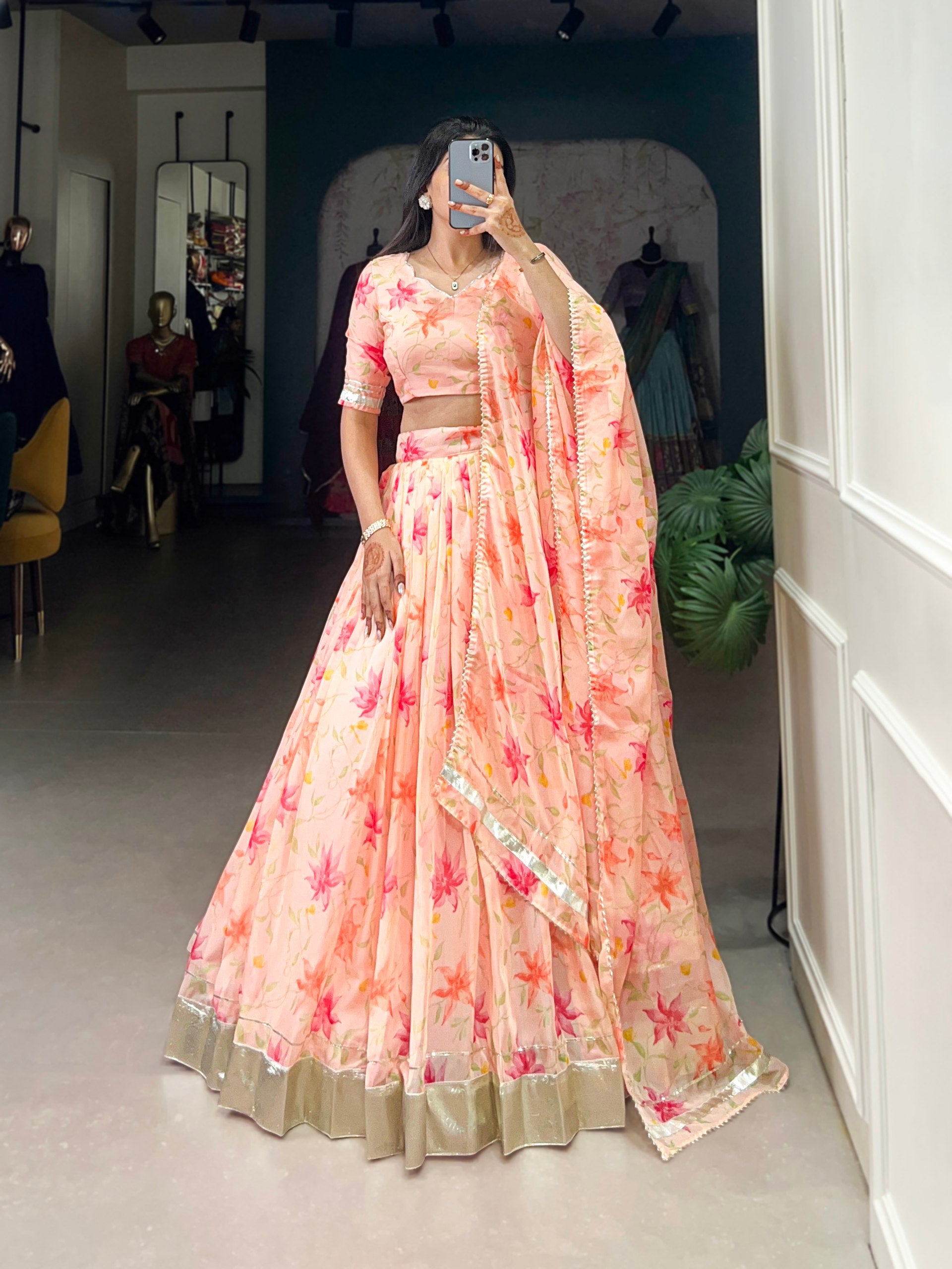 Peach Silken Blooms Tabby Silk Floral Print Lehenga with Lace Accents & Matching Dupatta Main image