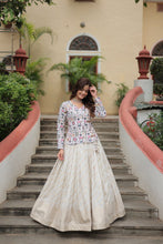 Load image into Gallery viewer, White Elegant Viscose Jacquard Lehenga with Embroidered Faux Georgette Peplum ClothsVilla.com