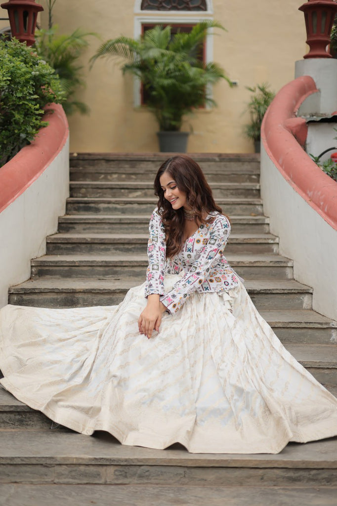 White Elegant Viscose Jacquard Lehenga with Embroidered Faux Georgette Peplum ClothsVilla.com