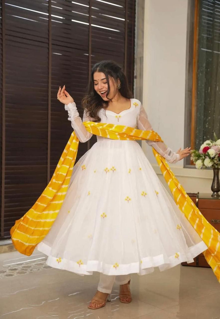 Yellow & White Celebrate Elegance with Our Exclusive Two-Color Anarkali Design ClothsVilla